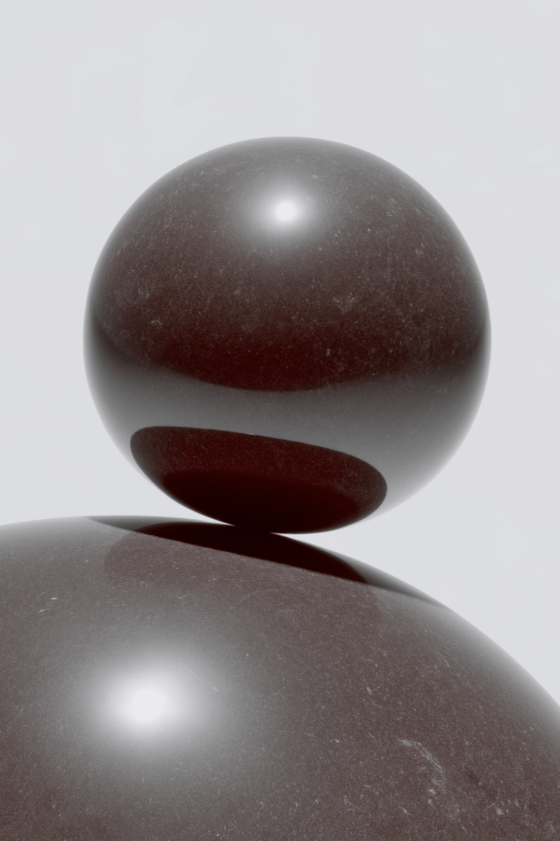 Two spheres representing balance and strategy in online business marketing
